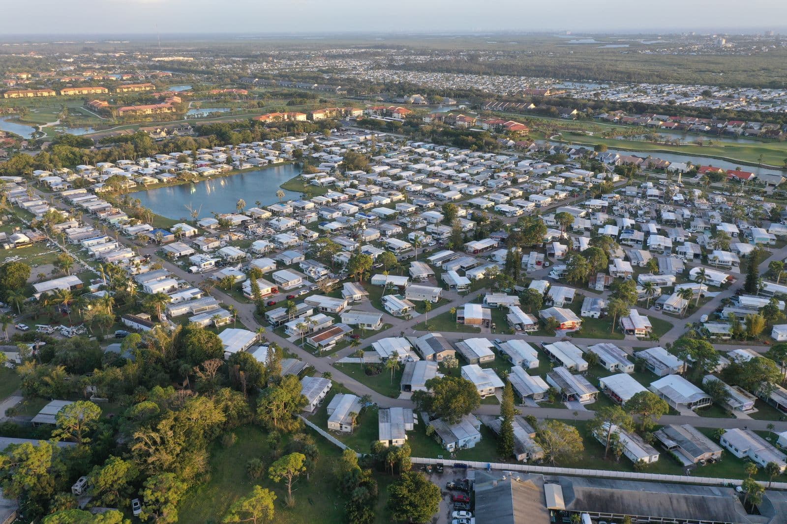 An aerial view of a Florida neighborhood beside lakes